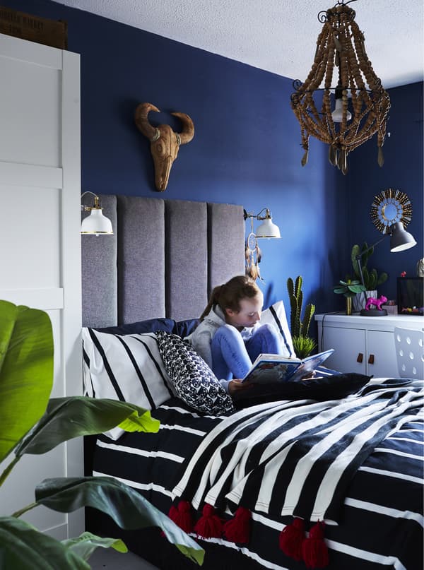 A portrait of Olivia in her bedroom.