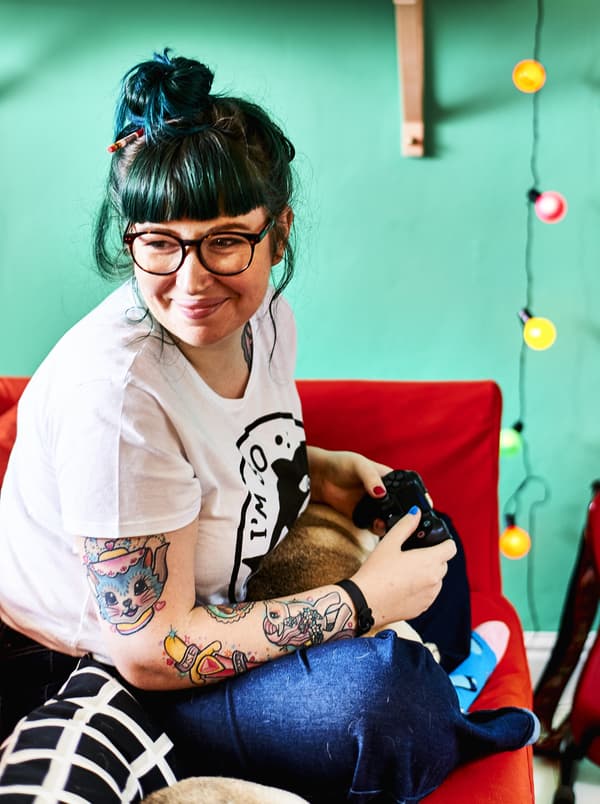 A portrait of Toni gaming.