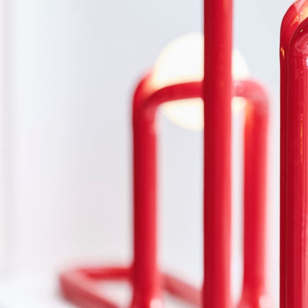 A red STRALA 2025 LED candelabra
