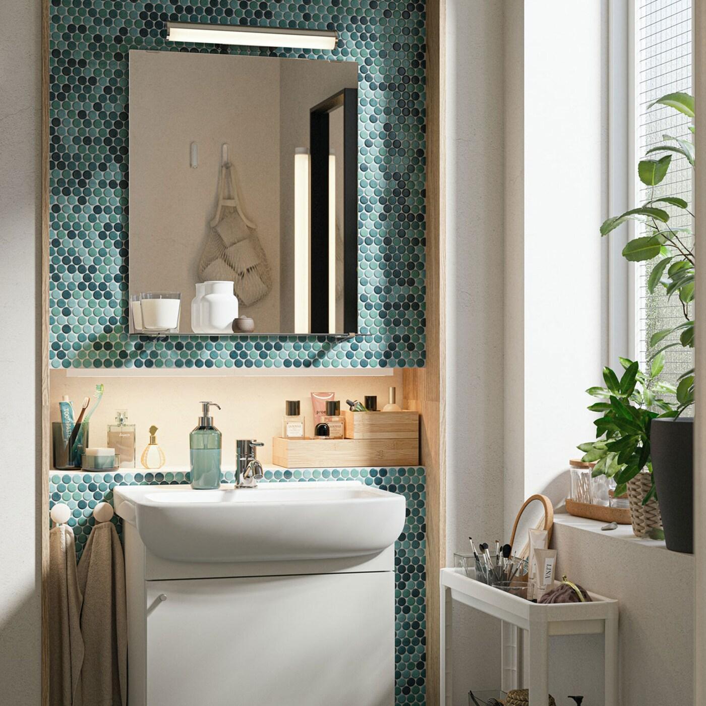 A refreshing bathroom and laundry nook in one