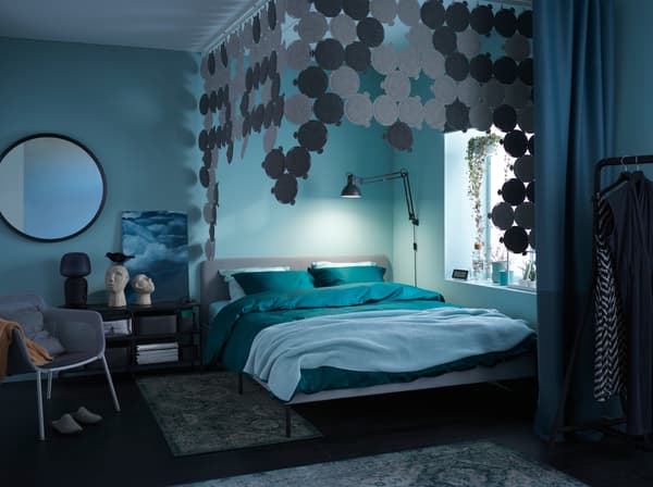 A relaxing bedroom atmosphere with green and blue tones