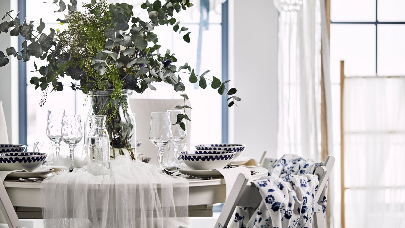 A Wedding Decorated With Blue And White Ikea