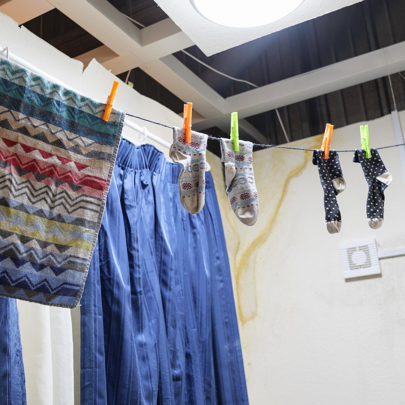 A room set inside IKEA Bristol that shows the poor living conditions of thousands of families