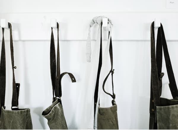 A row of hooks for Annika’s aprons