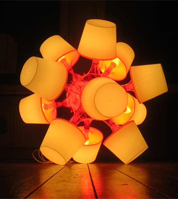 A sculpture made from IKEA lamps.