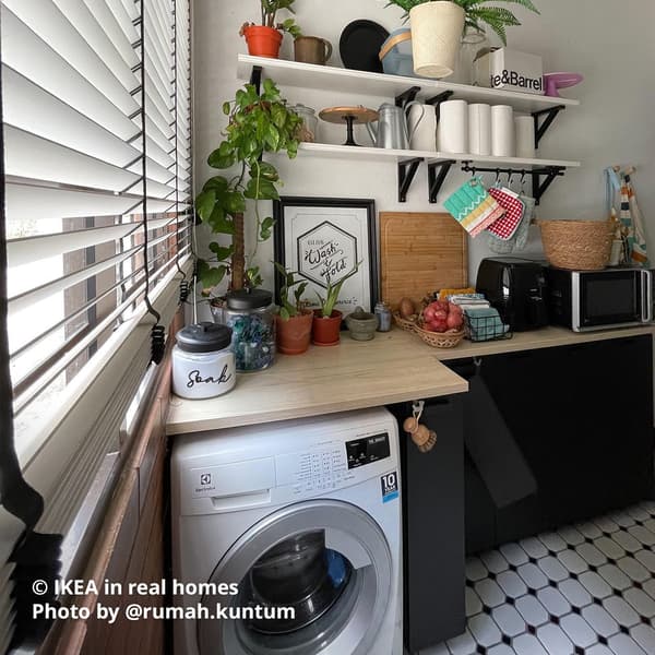 A service yard/laundry area with black METOD cabinet featuring IKEA in real homes Photo by @rumah.kuntum