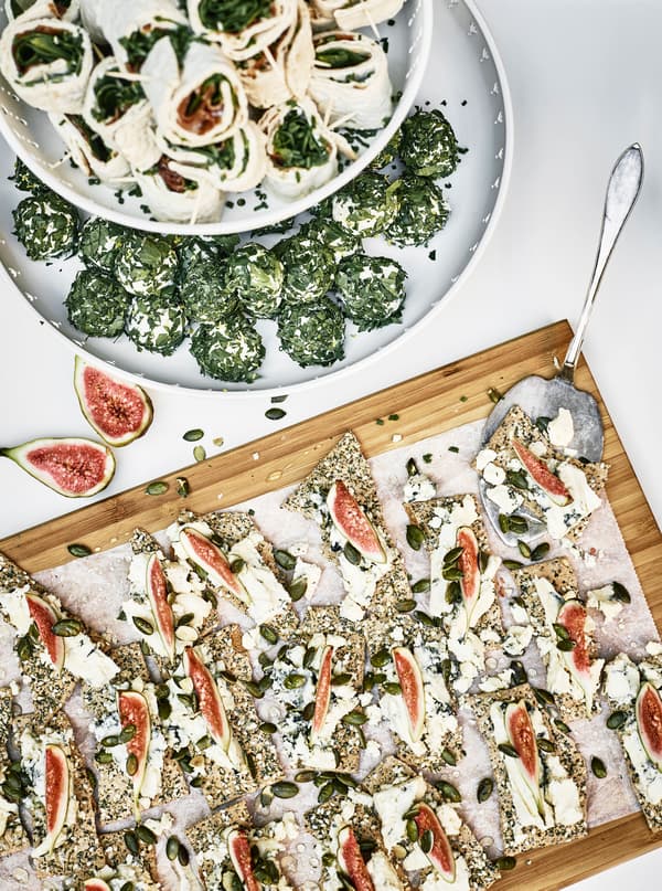 A shot from above of three different types of appetizers.