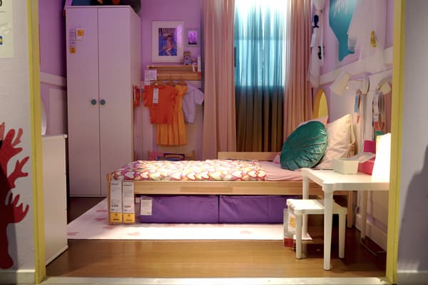 A showroom in IKEA Pasay City with SNIGLAR bed and GODISHUS wardrobe.