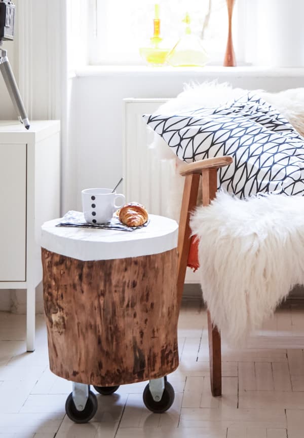 A side table on castors made from scrap wood.