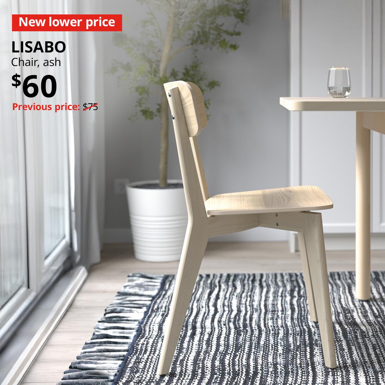 A side view of an ash LISABO chair in a dining room setting. Text on image reads "New lower price, LISABO, Chair, ash, $60, Previous price $75"