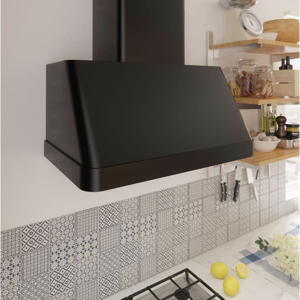 A sleek IKEA FOKUSERA black wall mounted extractor hood above a cooker.