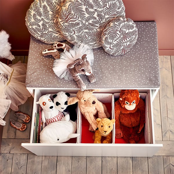 A SMÅSTAD system drawer filled with plushy toys.