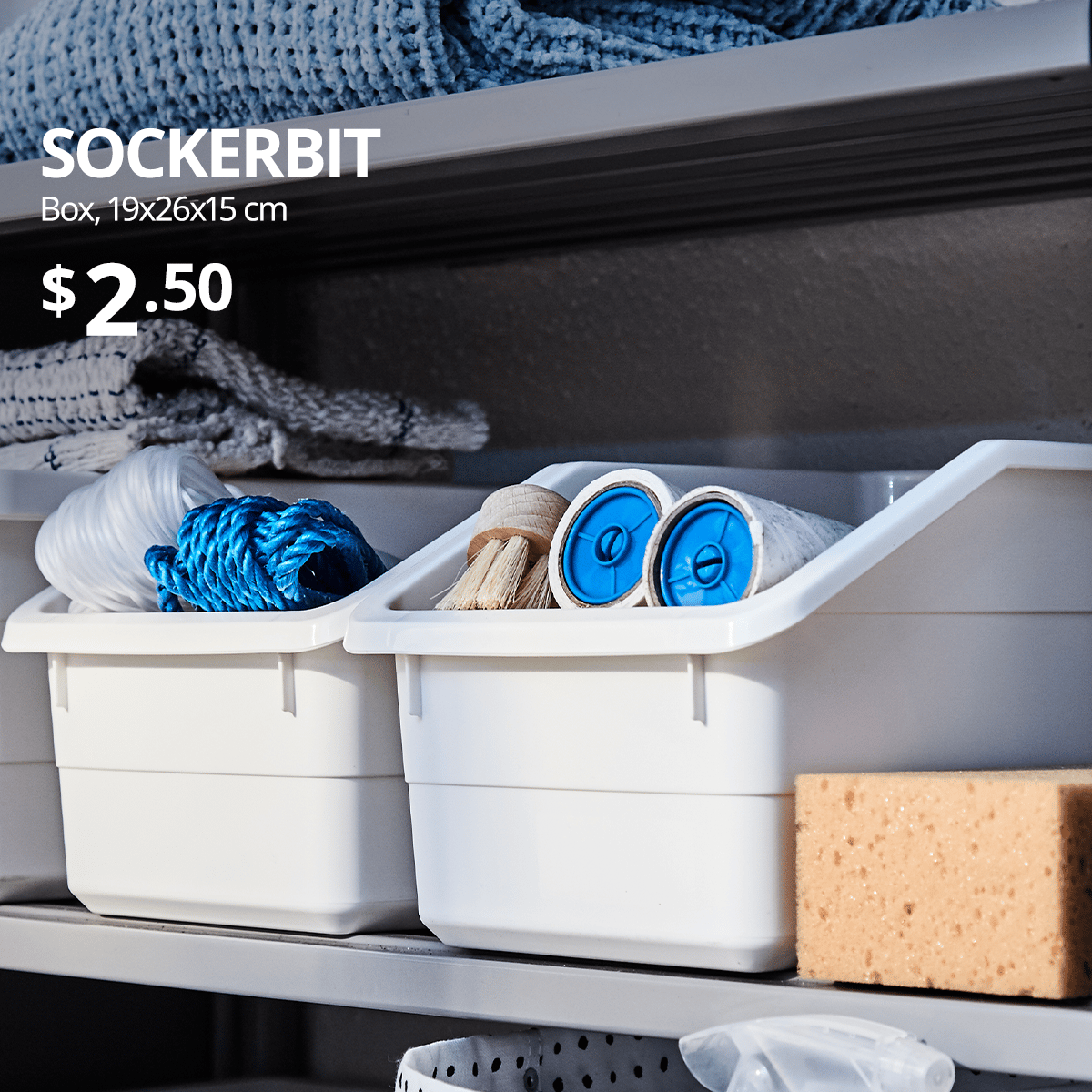 A SOCKERBIT box containing two BÄSTIS lint rollers and a brush placed on a shelve neatly. White text on top left of the image reads: SOCKERBIT, box, 19x26x15 cm, white. Price: $2.50.
SOCKERBIT is a small, durable box in fresh white that’s great for keeping screws and nails sorted in the garage or organising hobby supplies indoors. Use several boxes to sort smaller items and create a good overview.