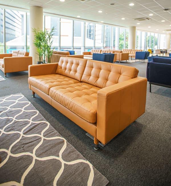 A spacious area featuring a 3-seater sofa.
