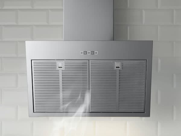A stainless steel colour BEMÖTA wall-mounted extractor hood.