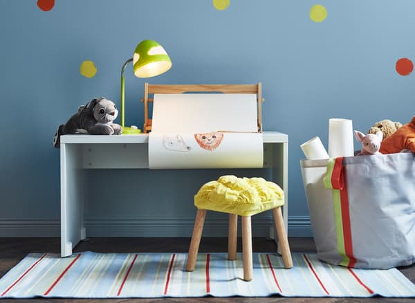 A storage bag and children’s stool can be used during nursing years and later during years of play