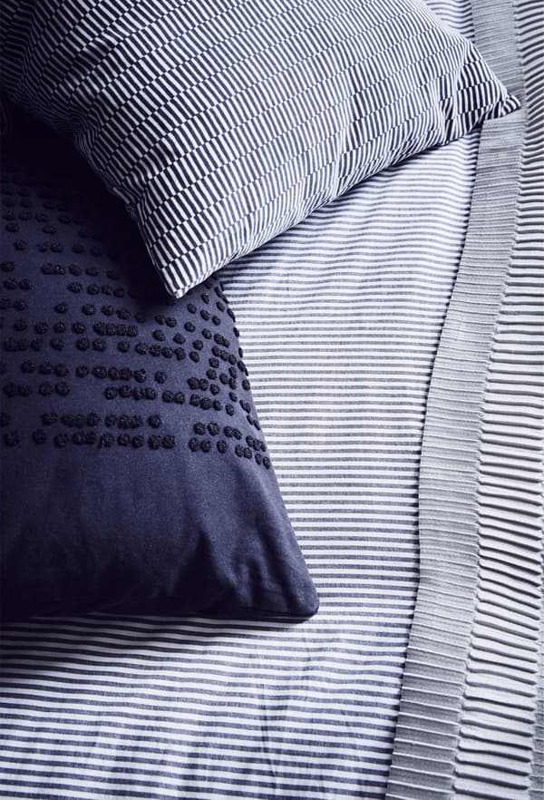 A striped quilt cover and pillowcase.