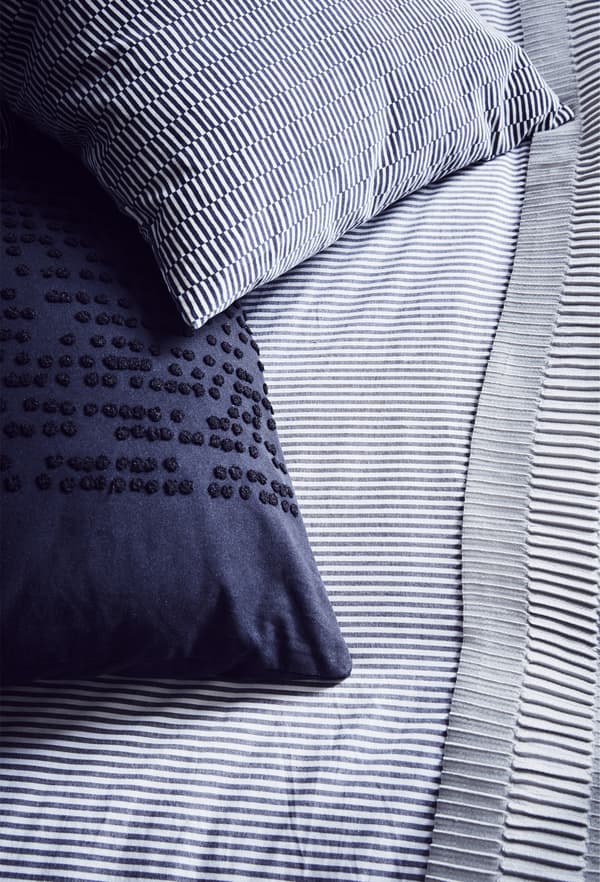 A striped quilt cover and pillowcase.