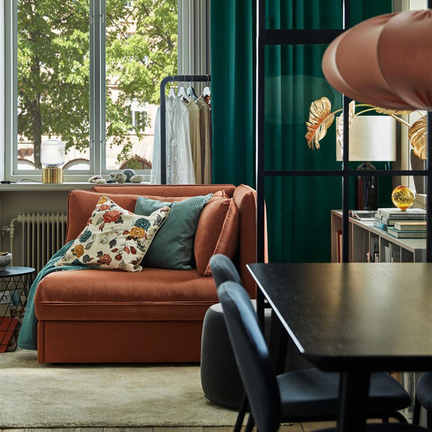 A stylish living room and bedroom in one