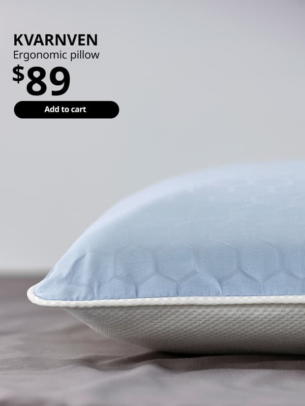 A tight-shot of KVARNVEN ergonomic pillow. Text on image reads, KVARNVEN, Ergonomic pillow. Price at $89.