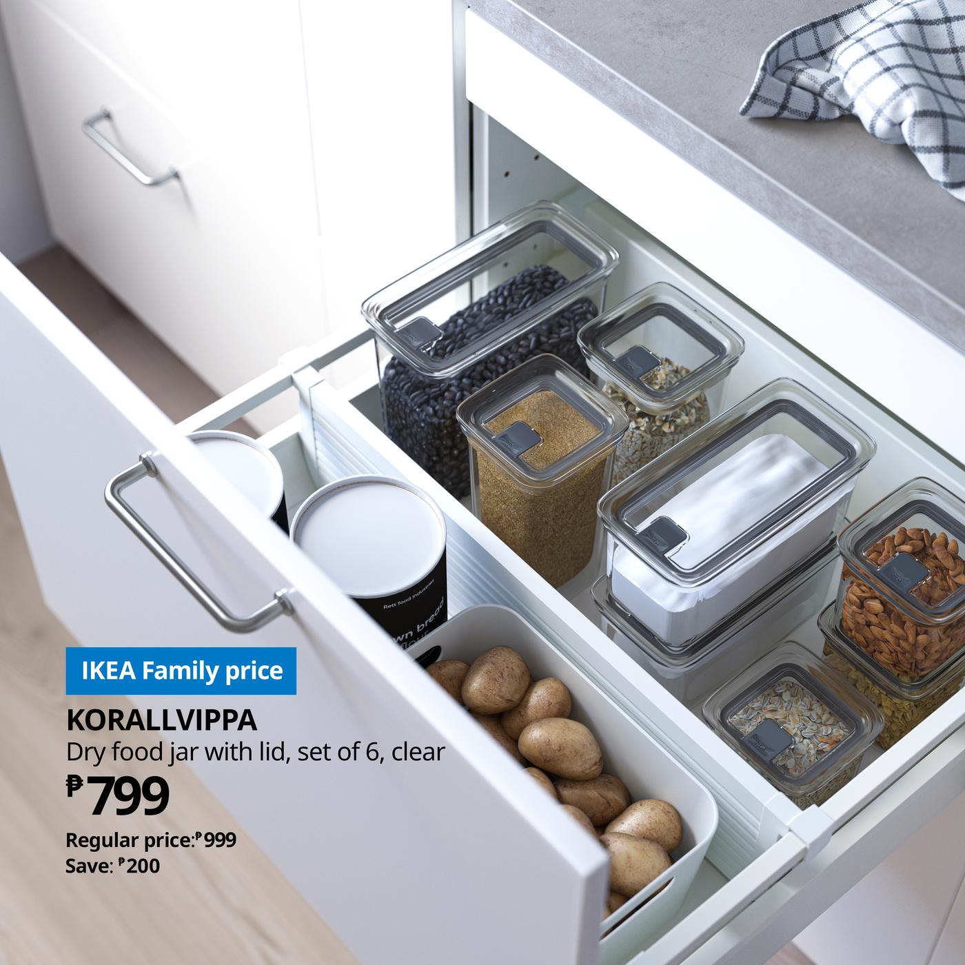 A transparent KORALLVIPPA dry food jar with lid in the kitchen