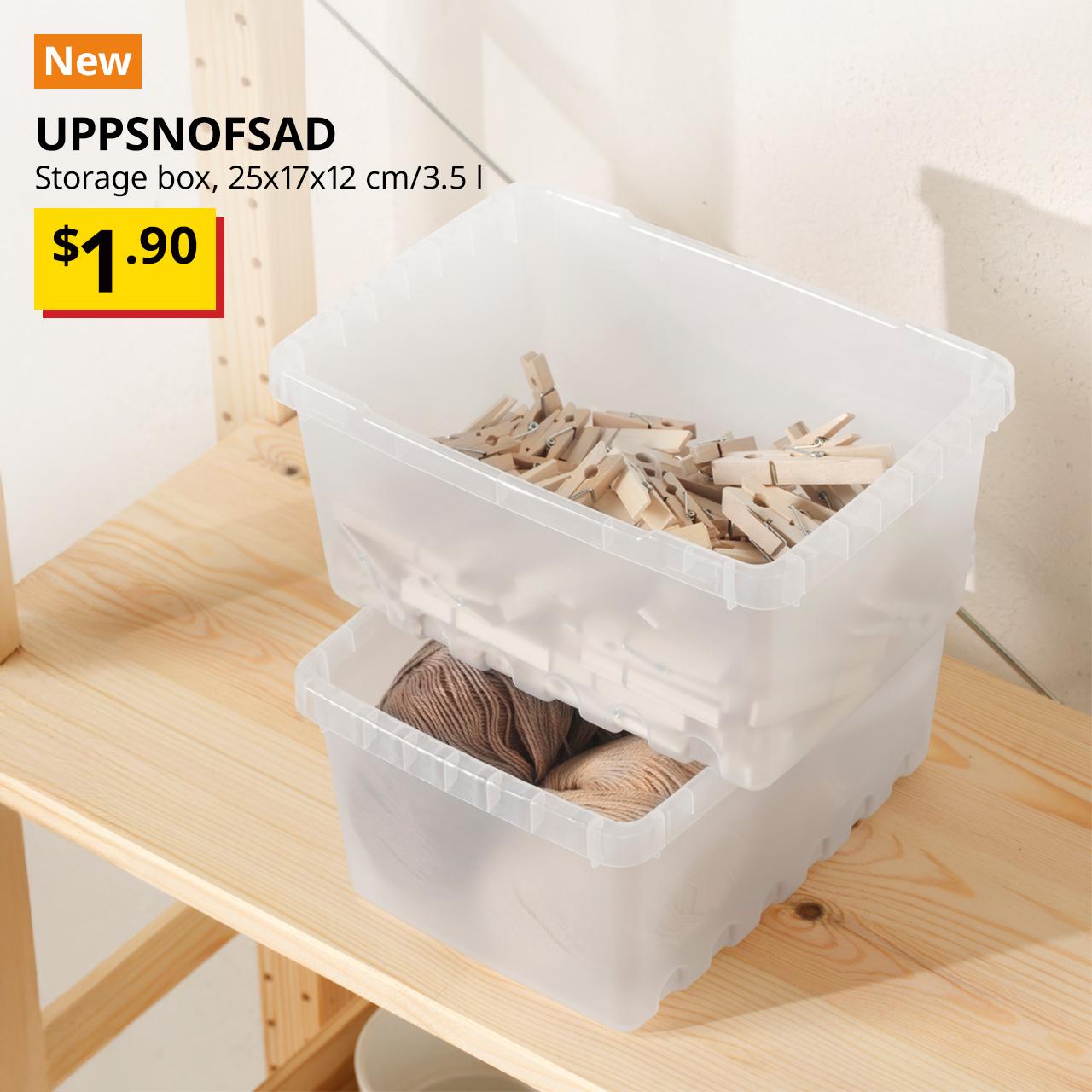 A transparent white UPPSNOFSAD storage box used to organise pegs and other stuff placed on a IVAR pine shelving unit. Black text overlay image on the left that reads, "UPPSNOFSAD, Storage box, 25x17x12 cm/3.5 l" with the BTI price in yellow/red and black text: $1.90.