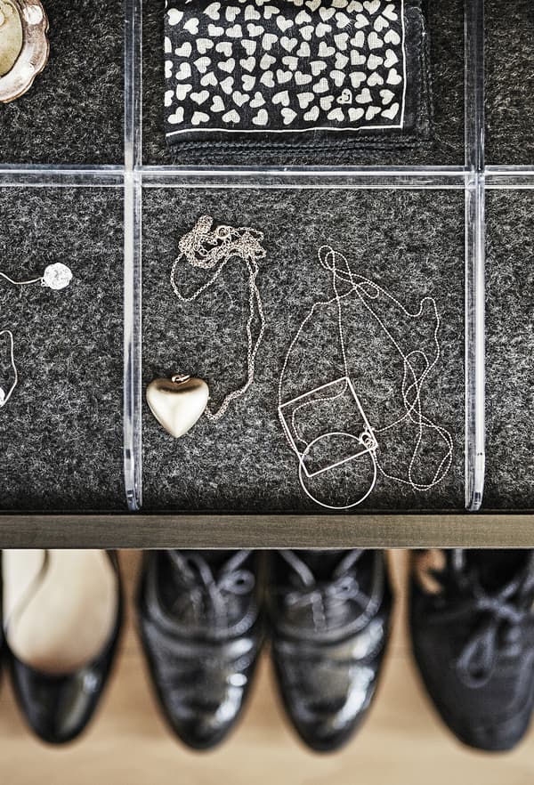 A tray with accessories and shoes.