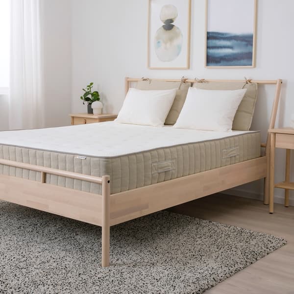 A view of a room with a mattress