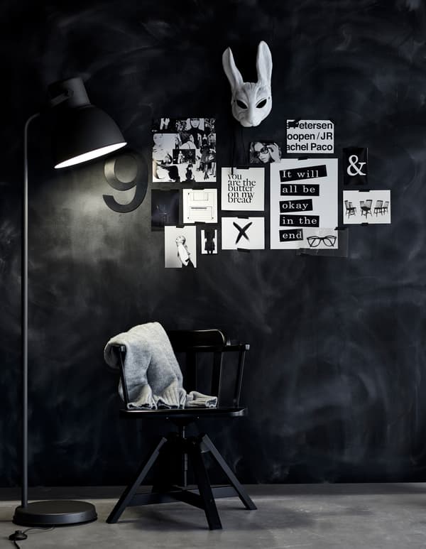 A wall made into an inspiration board using removable tape.