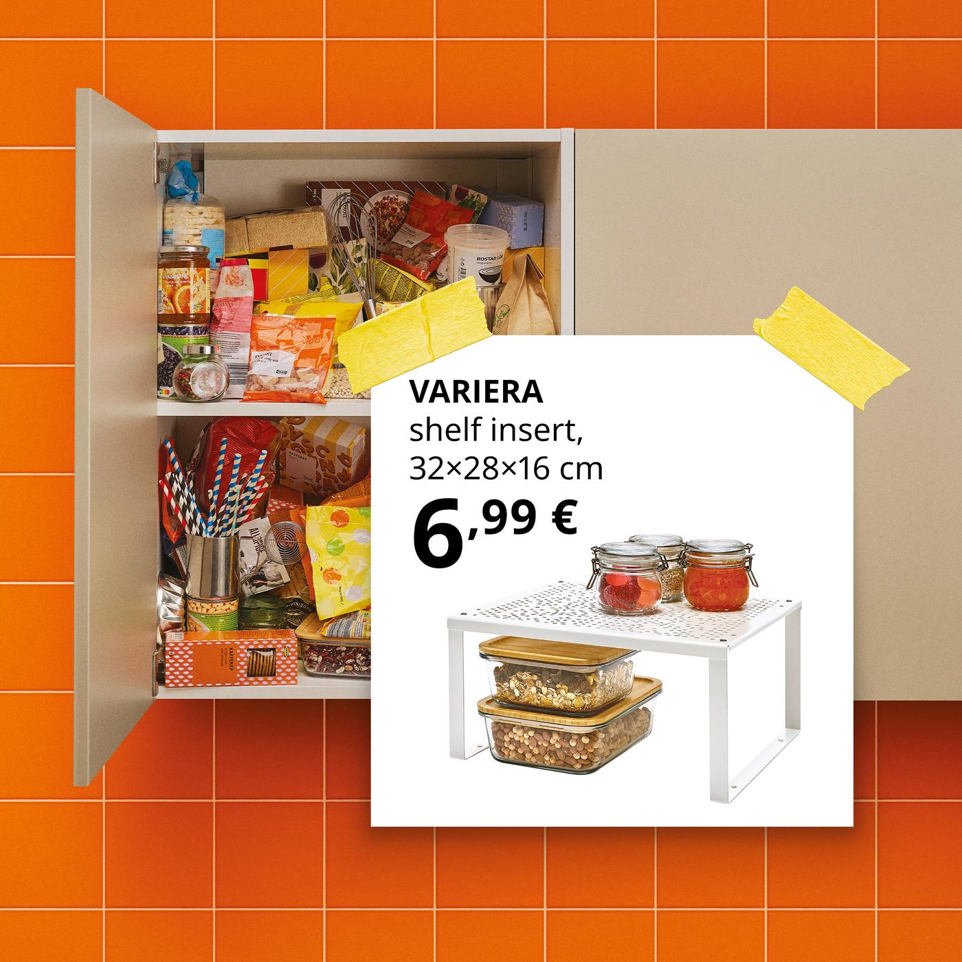A wall-mounted kitchen cabinet set against orange tiles stands open, revealing a clutter of packets, spices and other everyday items. A white sticker overlay highlights a simple solution—a VARIERA shelf insert for 6,99 €—to neatly organise everything inside the cupboard.