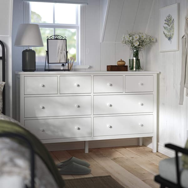 A white 8-drawer dresser.