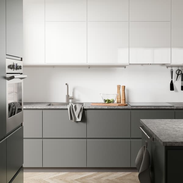 A white and grey VOXTORP and RINGHULT kitchen