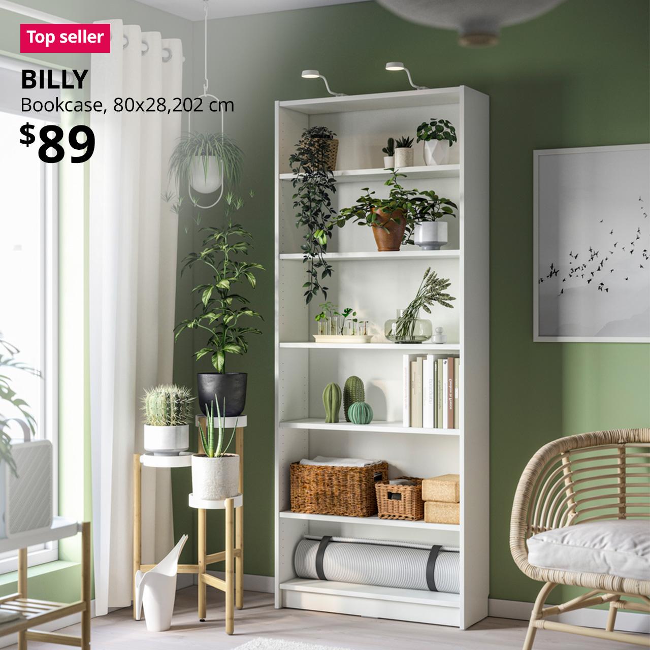 A white BILLY bookcase shelving placed in a living room setting. A red "Top seller" label is on the top left of image, with white text below that reads: BILLY, Bookcase, 80x28x202 cm. Price: $89.