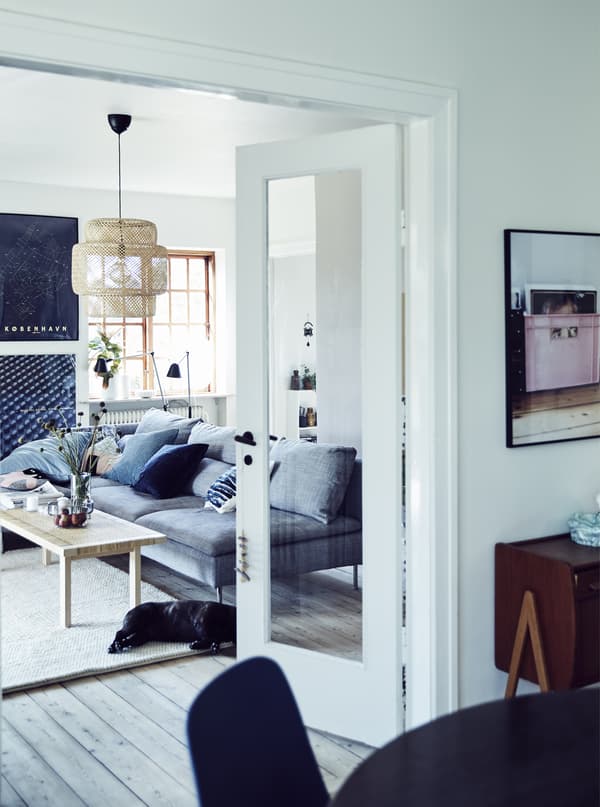 A white, bright living and dining space.