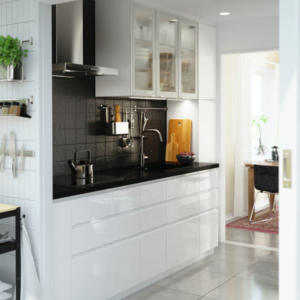 A white gloss VOXTORP in a straight line