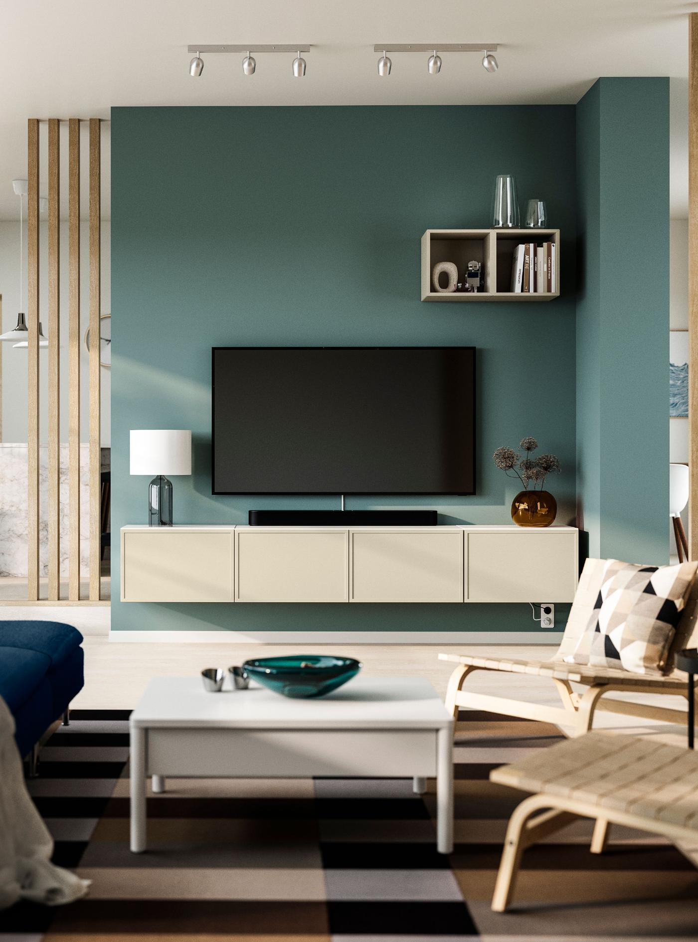 A white/Krukmakare beige BESTÅ TV bench with doors in the living room