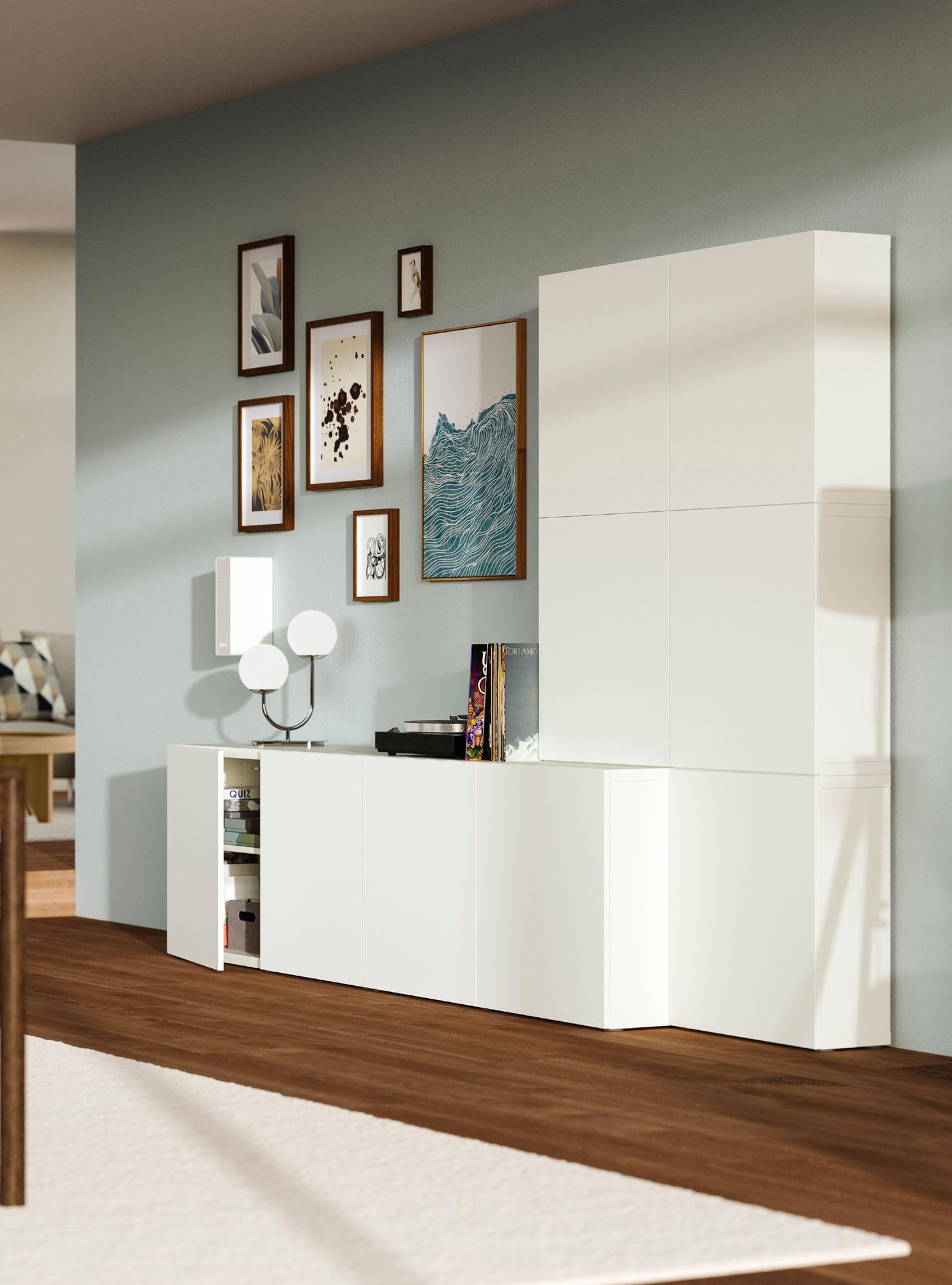 A white Lappviken/white BESTÅ storage combination with doors in the living room