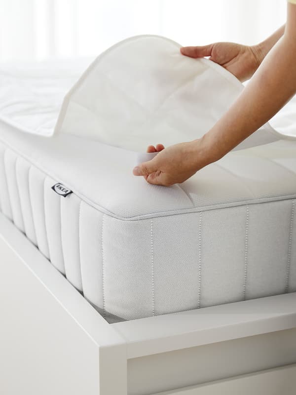 a white mattress protector on top of a mattress