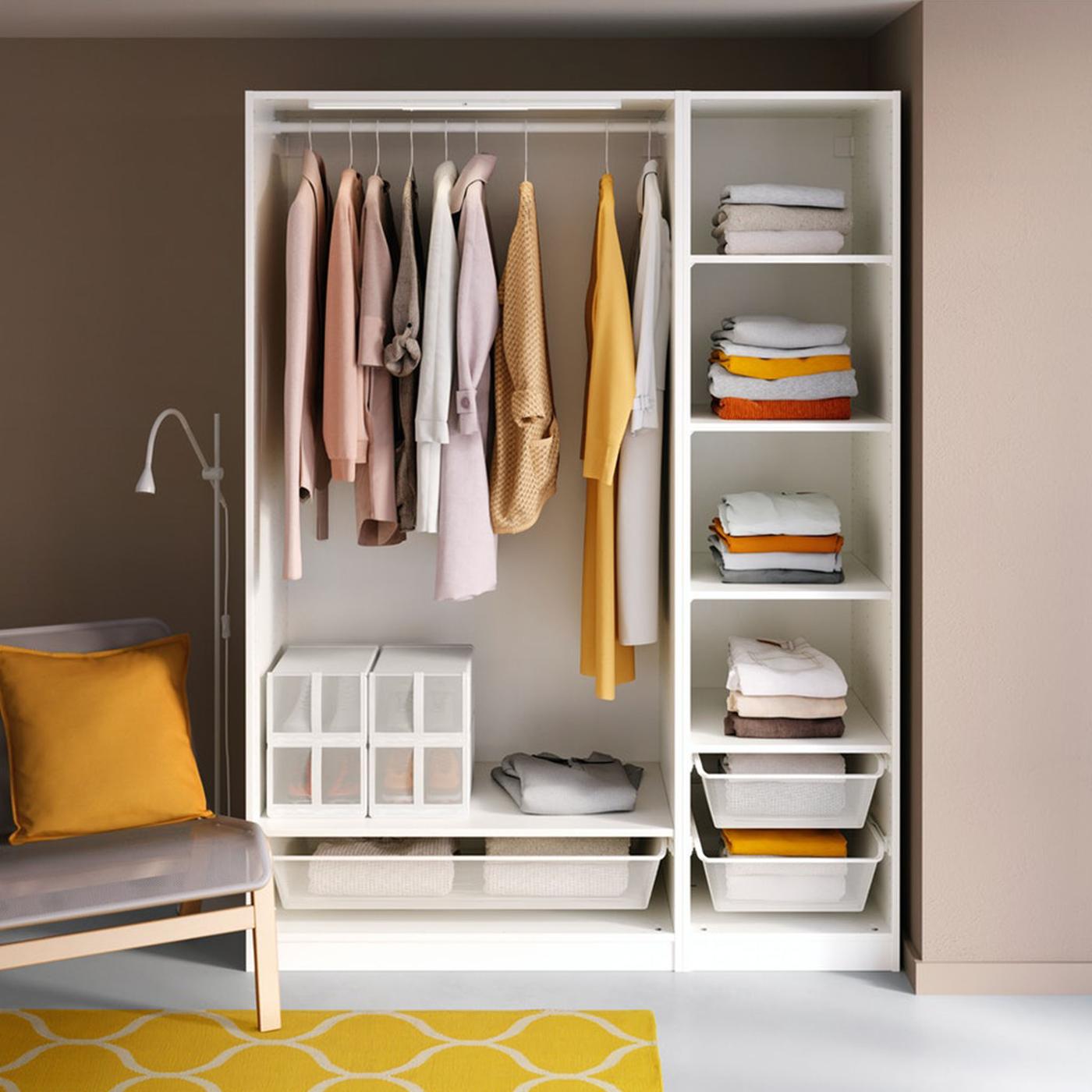 A white PAX wardrobe with shelves and a hanging part