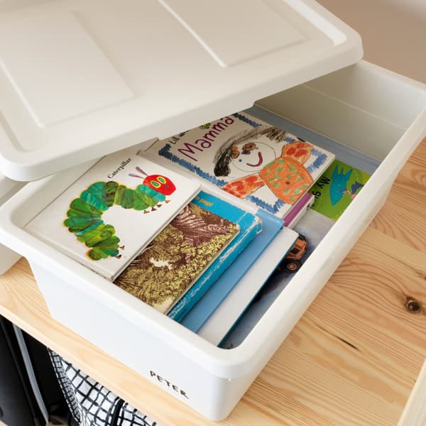 A white SAMLA case willed with children's books