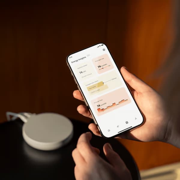 A white smart DIRIGERA hub for smart products