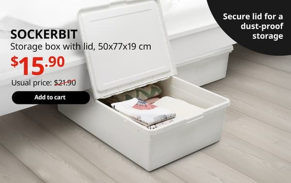 A white SOCKERBIT storage box with a lid is utilised as under-bed storage in the bedroom setting. On the top left-hand corner, black text that reads 