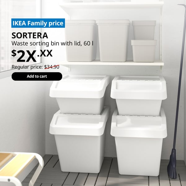 A white SORTERA waste sorting bin in the service yard. On the top left corner, a blue tag with white text that reads 