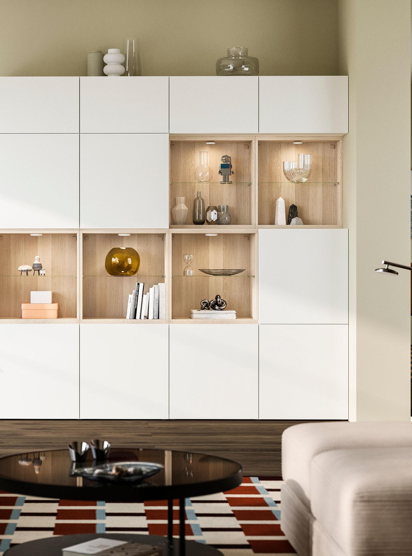 A white stained oak/Lappviken white BESTÅ storage combination with doors in the living room