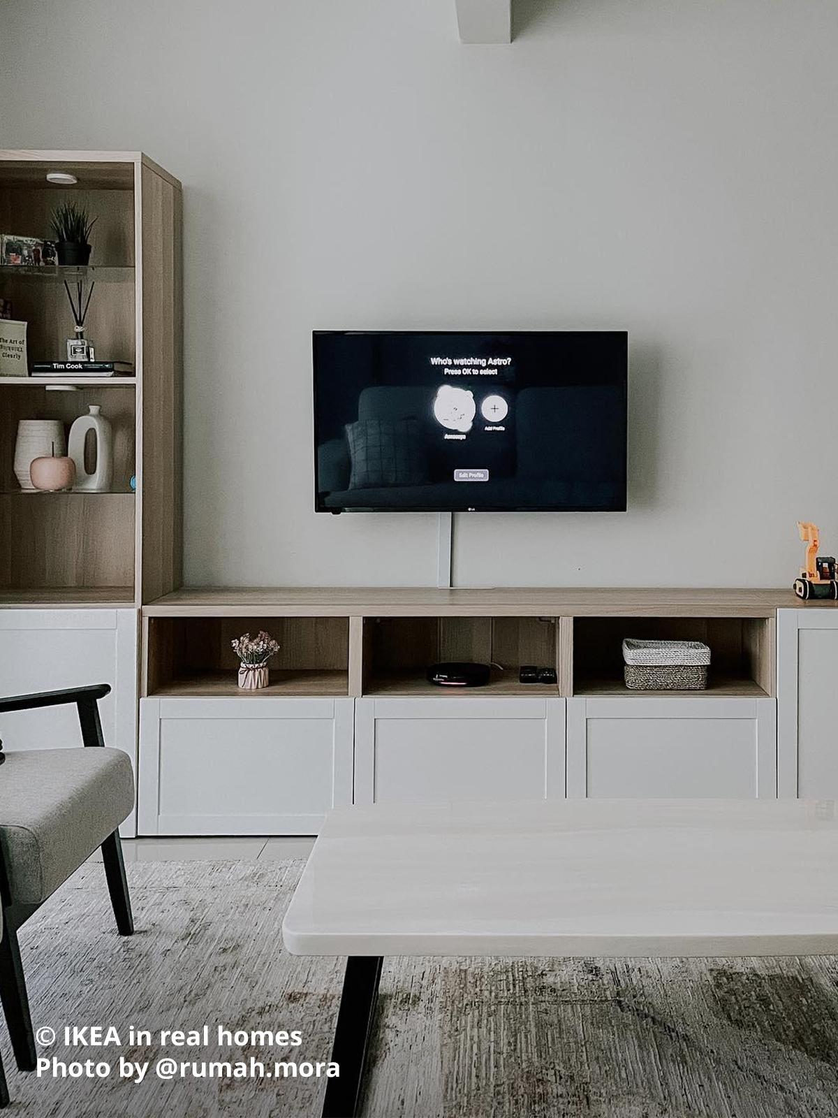 A white-stained oak with white door front BESTA TV wall storage combination solution in a living room setting . IKEA in real homes Photo by @rumah.mora