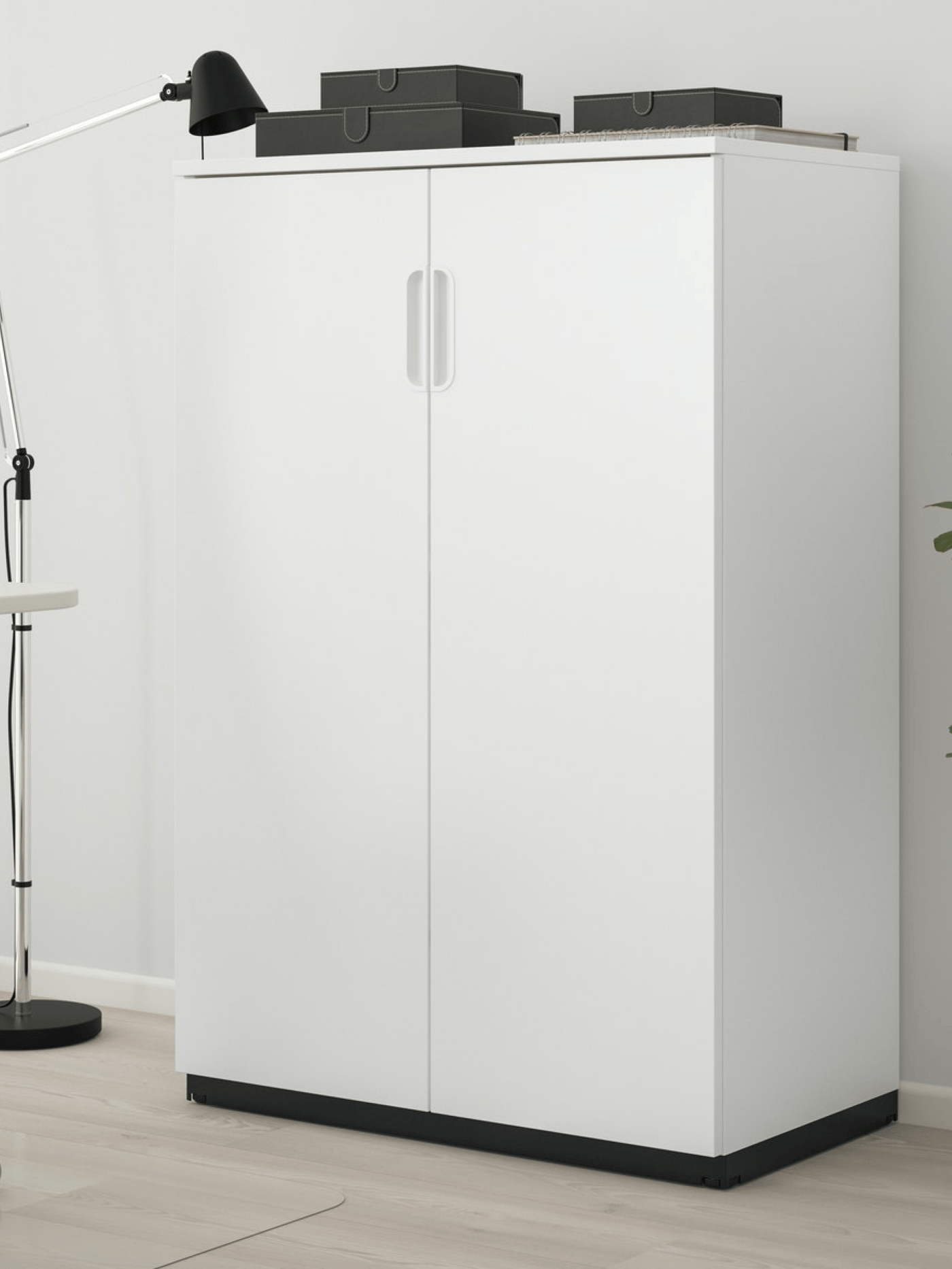 A white storage unit for an office