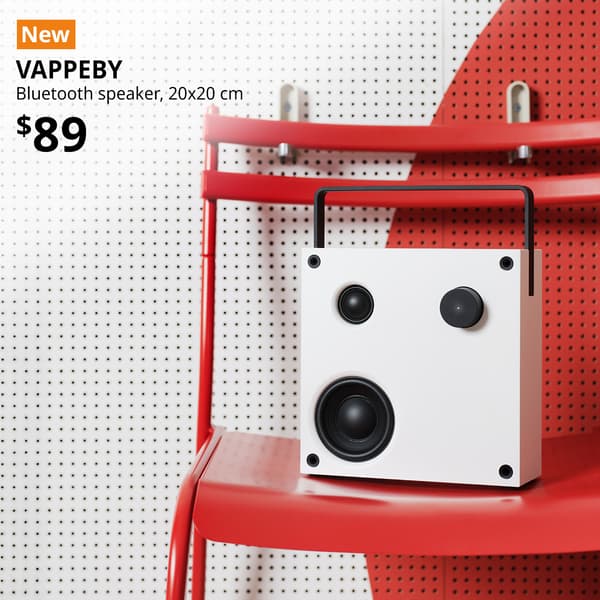 A white VAPPEBY bluetooth speaker placed on a red outdoor chair. An orange "NEW" label is on the top left of the image with black text that reads: VAPPEBY, Bluetooth speaker, 20x20 cm. $89. 