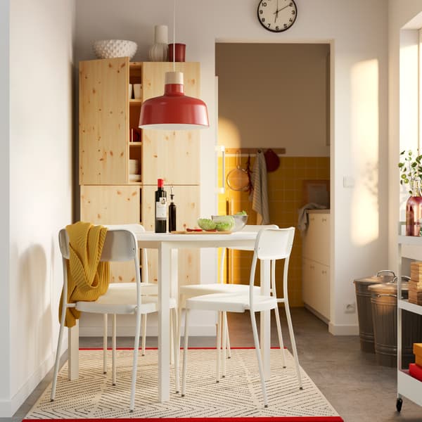 A white white/white VIHALS table and 4 chairs