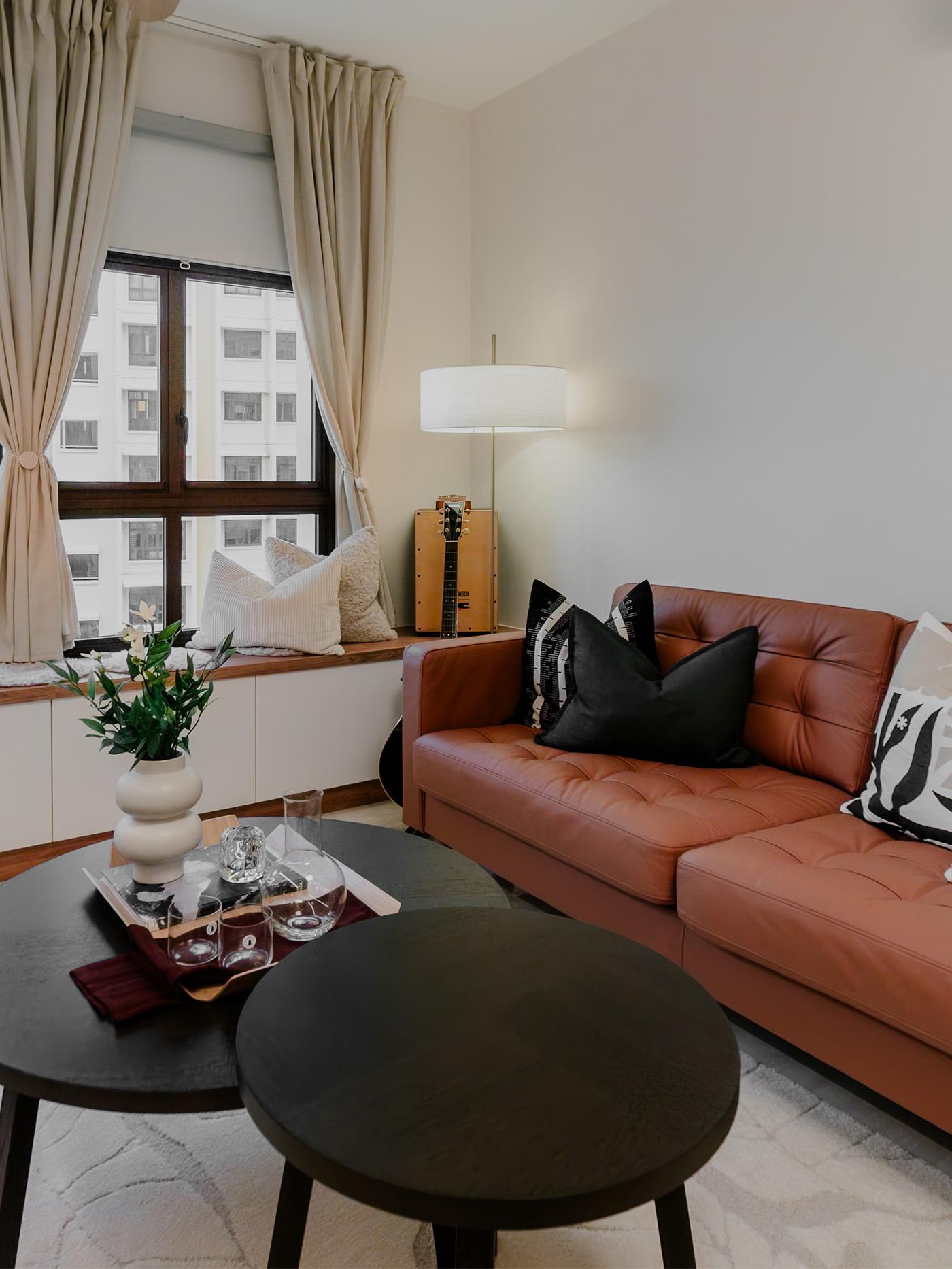 A wide shot of a living room from a traditional modern 4-room BTO flat in MacPherson, Singapore, designed by IKEA Home design service.