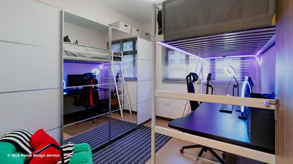 A wide shot of a teens bedroom featuring a VITVAL loft bed and SKYTTA wardrobe from a traditional modern 4-room BTO flat in MacPherson, Singapore, designed by IKEA Home design service.